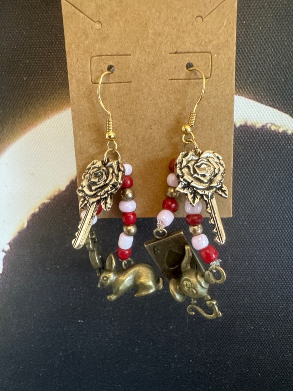 Painting the Roses Red - Gold Toned Rose & Wonderland Charms Dangle Earrings